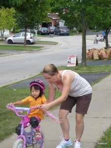 Elspeth has decided that she does not want her training wheels anymore.  No success thus far but it is a start.