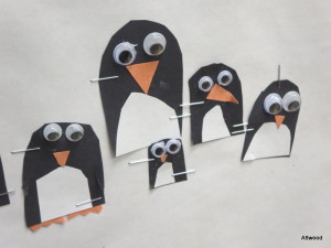 This penguin family has dad, mom, two sisters and an "extra...maybe an uncle".