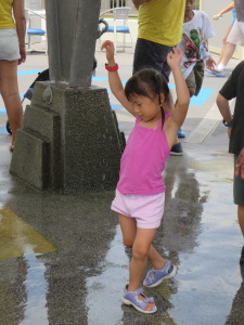 Cooling off in one of the misters.