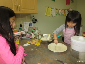 Girls even started to help. A special thank you to the person who shared that rolling out the pastry in between parchment paper makes all of the difference. It rolled beautifully and baked up just as nicely.